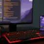 Gaming desk setup showing WoW client and Discord app integration for guild communication