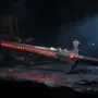 Ornate fantasy greatsword with glowing red runes on dark forge workbench in Throne and Liberty
