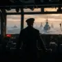 Naval commander silhouette on battleship bridge overlooking ocean fleet at dawn